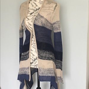 - Long blue and tan sweater. Like new.